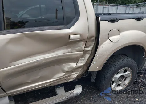 2002 Ford Explorer Sport Trac z USA, uszkodzony, nr VIN 1FMZU67E92UB97869